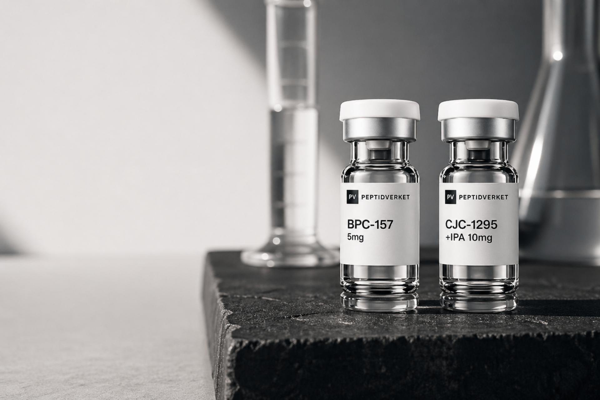 Peptidverket BPC-157 and CJC-1295 lab-grade peptide vials on a stone surface